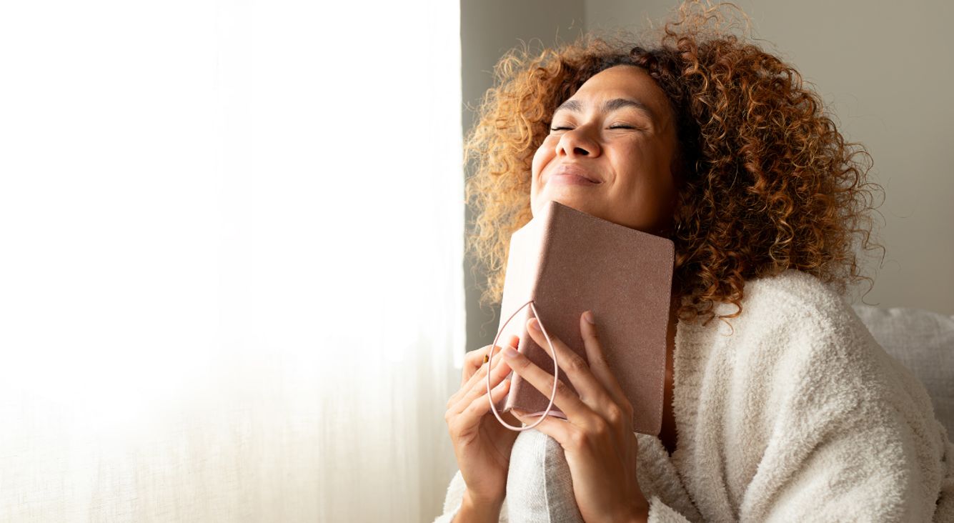 Person mit Buch